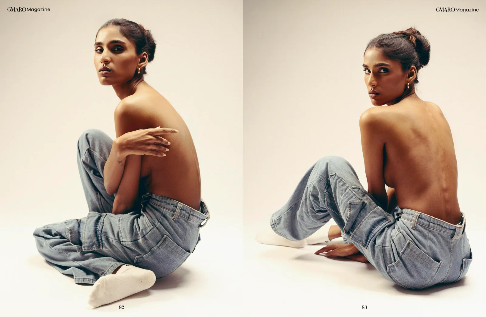 GMARO Magazine "Wilderness Worn" spread, model seated in denim against a white backdrop, photographed by Shreyak Singh